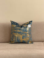 Coussin décoratif en velours bleu doré