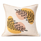 Coussin en velours motif feuillage graphique