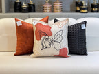 Coussin décoratif en velours brique