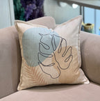 Coussin en velours motif feuille minimaliste