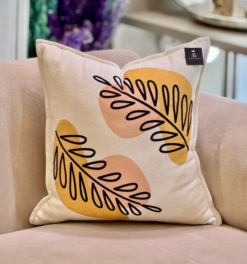 Coussin en velours motif feuillage graphique