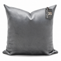Coussin décoratif en velours gris